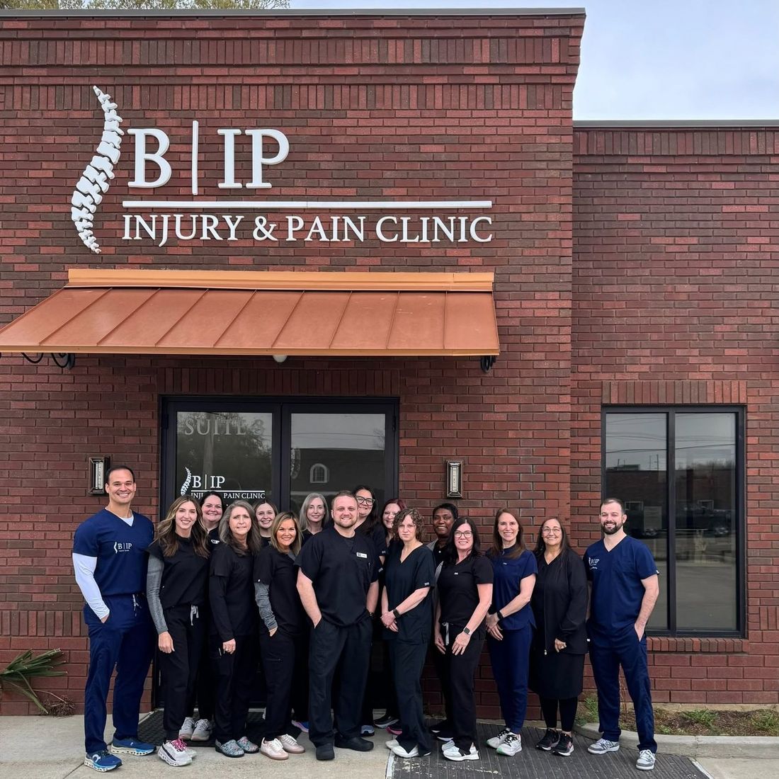 The Bayonne Injury & Pain Clinic team outside the clinic in West Monroe, Louisiana